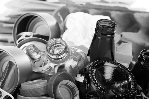 Workers sorting items in a flat during a clearance in Kensington